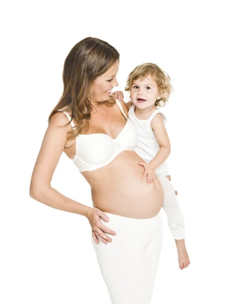 Zwangere vrouw met haar dochter — Stockfoto