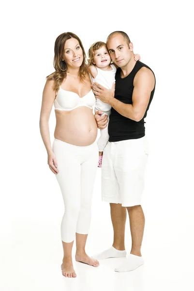 Pregnant woman with her family — Stockfoto