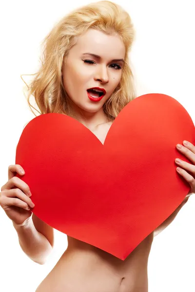 stock image Beautiful woman with big red heart