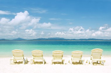 Concept photo of beach with chair
