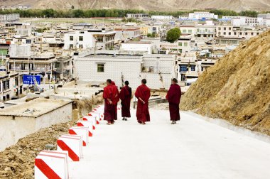 Few monks walking clipart