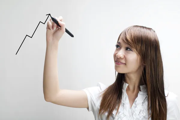 Young woman drawing graph — Stock Photo, Image
