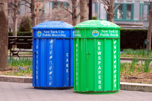 Two recycle bins for paper and bottles — Stock Photo, Image