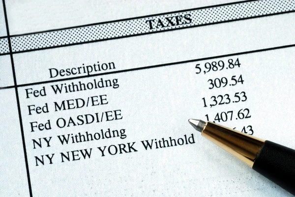 Lista dos impostos retidos na fonte — Fotografia de Stock
