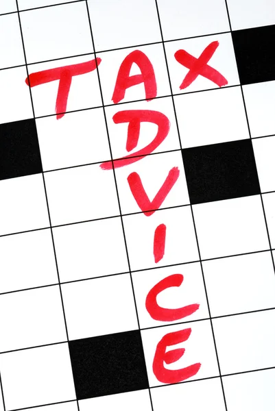 Écrivez les mots Conseils fiscaux dans le puzzle des mots croisés — Photo