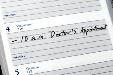 Mark the doctor appointment in the day planner clipart