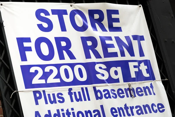 Store for rent sign concepts poor economy — Stock Photo, Image