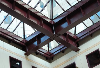 Steel beams in a modern commercial building clipart