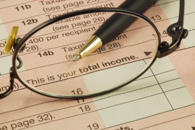 Focus on the total income in the Income Tax return clipart