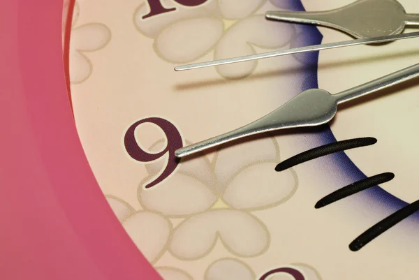 Clock hands pointing to number Nine — Stock Photo, Image