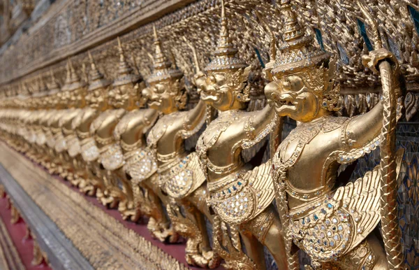 Golden figures warrior in royal palace — Stock Photo, Image