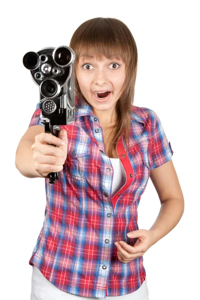 Girl in plaid shirt with movie camera — Stockfoto