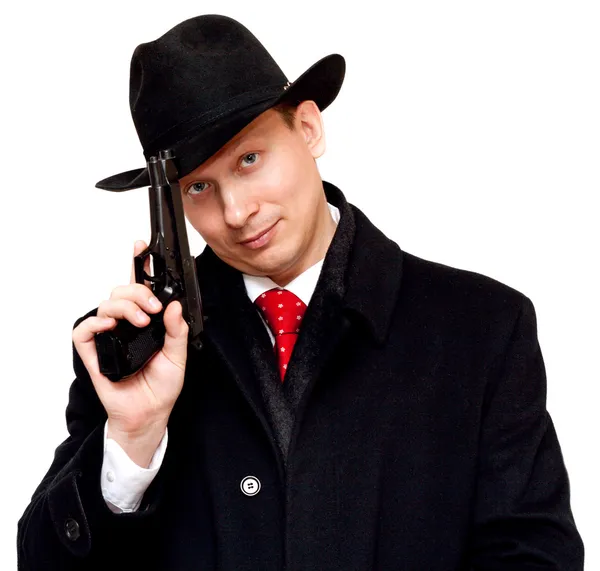 スーツ、赤いネクタイ銃を持つ男 — ストック写真