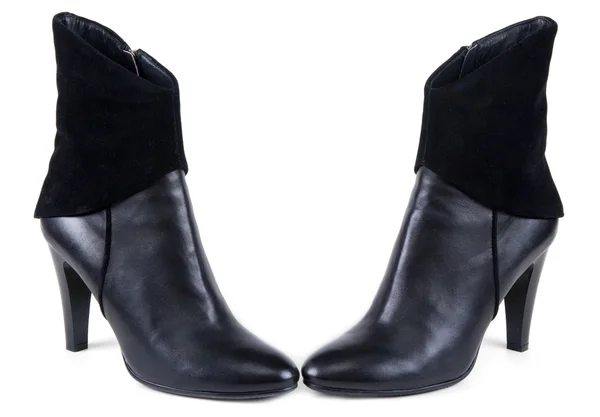 Чёрные женские кожаные сапоги — стоковое фото
