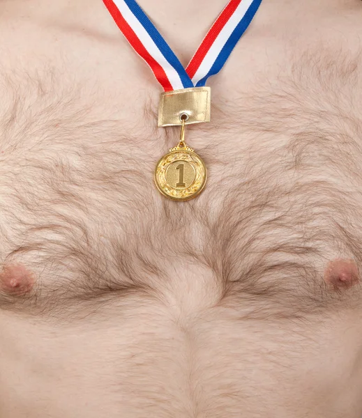 Nude male thorax with golden medal — Stock Photo, Image