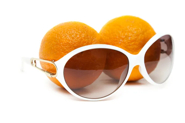 Sunglasses and two oranges — Stock Photo, Image