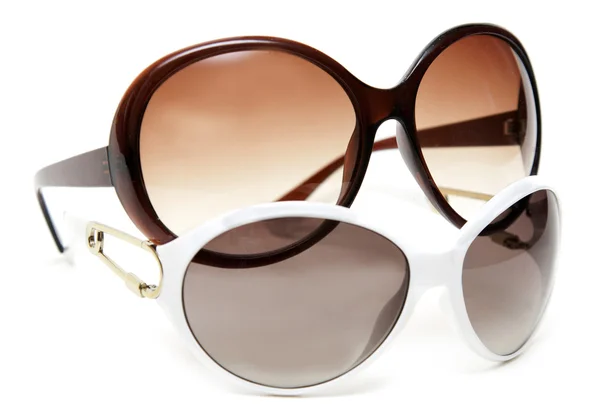 Dva sunglasseses bílá a hnědá — Stock fotografie