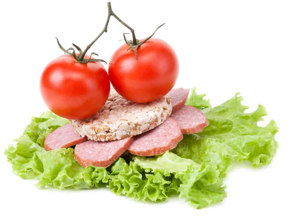 Sandwich with sausage, tomatoes and salad — Stock Photo, Image
