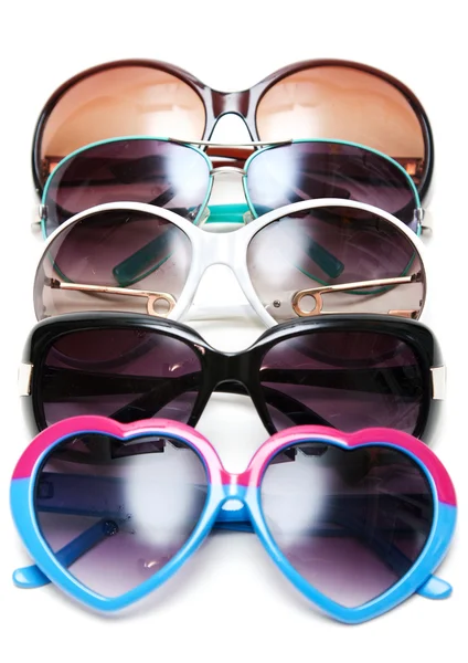 Much sunglasseses put in row — Stock Photo, Image