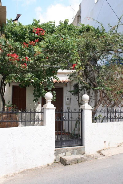 stock image Old house on Crete with gate and garden