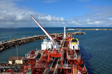 Loading of chemical tanker clipart