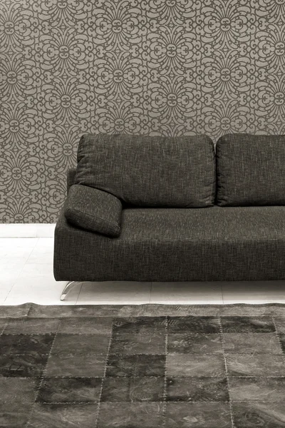 Donkere sofa — Stockfoto