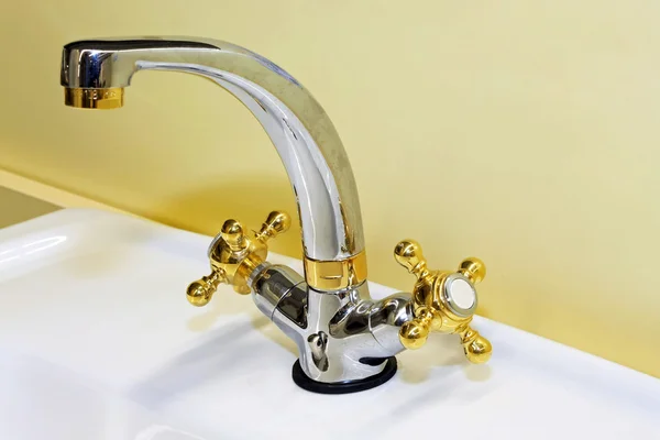Golden faucet — Stock Photo, Image