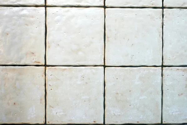 Гранж-белые плитки — стоковое фото