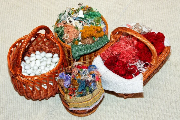 Silk in basket — Stock Photo, Image