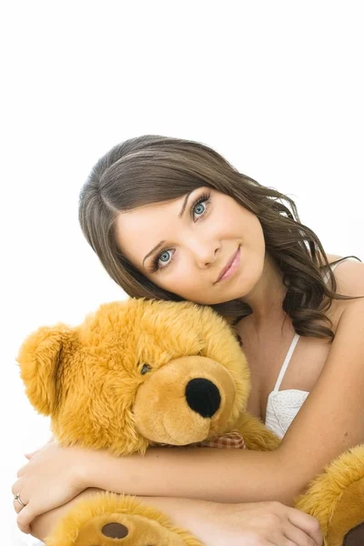 Mladá žena s hračka medvěd — Stock fotografie