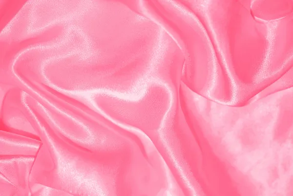 Розовый атласный фон — стоковое фото