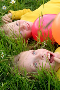 Children and balloons