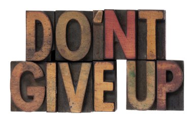 Do not give up phrase in wooden type clipart