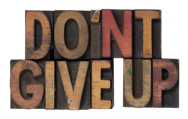 Do not give up phrase in wooden type