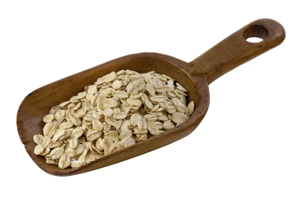 Scoop of rolled oats — Stock Photo, Image