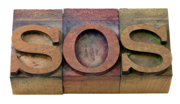 Sos sign in letterpress type — Stock Photo, Image