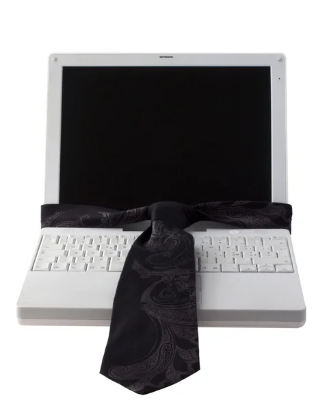 Laptop met zwarte stropdas Stockfoto