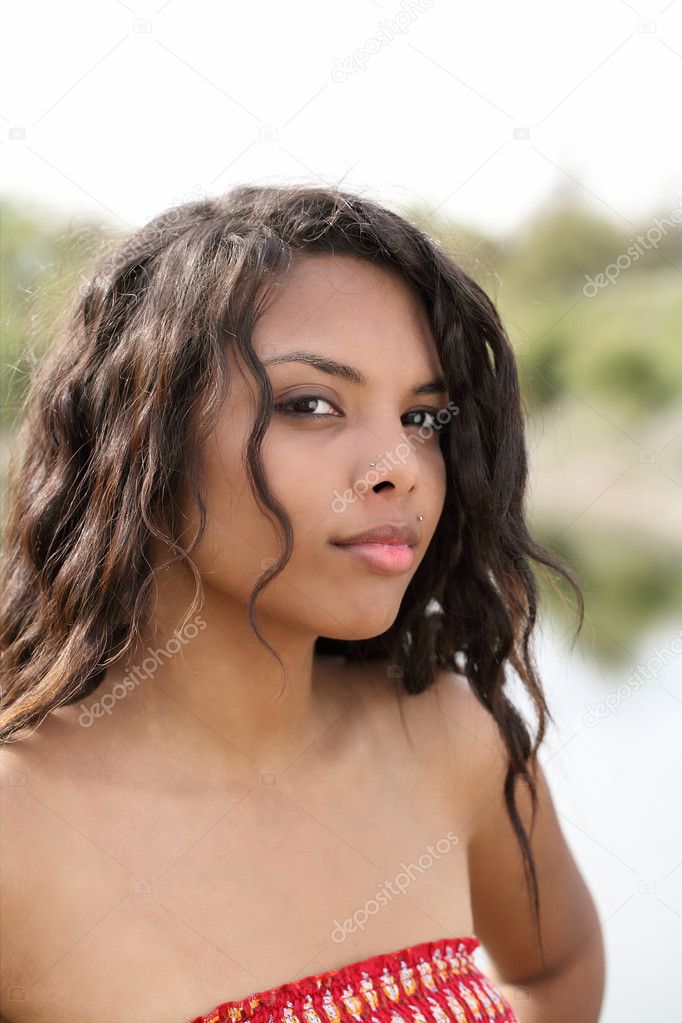 Attractive mixed ethnic teen girl outdoor portrait