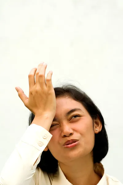 Asian woman with forget expression — Stock Photo, Image
