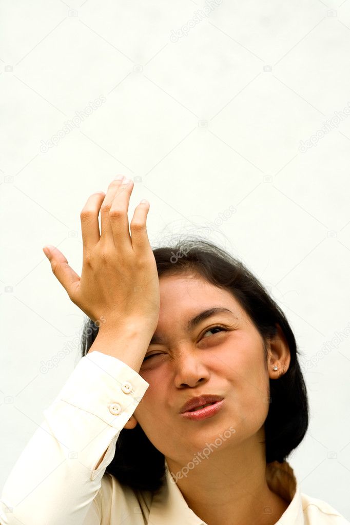 Asian woman with forget expression