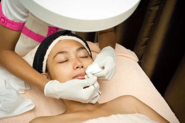 Woman face in facial treatment — Stock Photo, Image