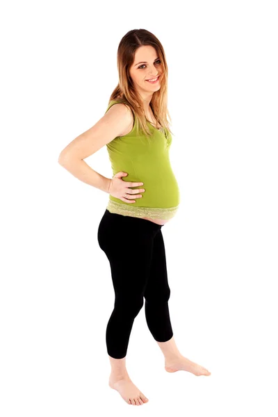 Улыбающаяся беременная женщина — стоковое фото