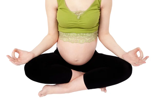 Donna incinta che pratica yoga — Foto Stock
