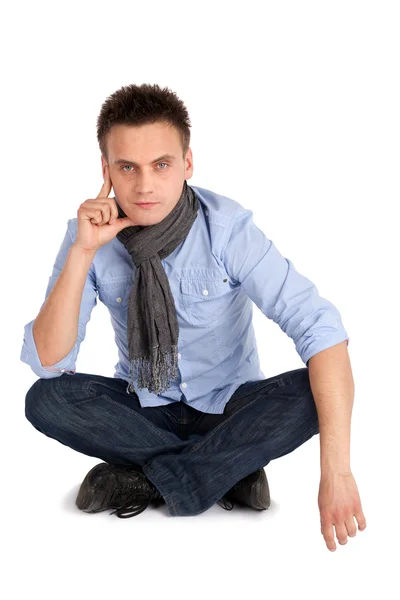 Thoughtful Man Sitting with Legs Crossed — Stock Photo, Image