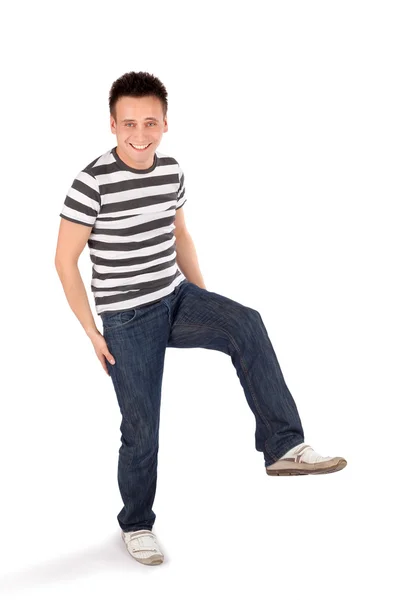 Happy Casual Man Standing on One Leg — Stock Photo, Image