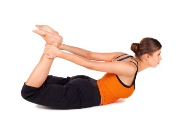 Woman Practicing Yoga Exercise Called Bow Pose clipart