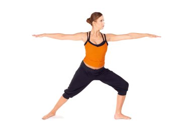 Fit Attractive Woman Practicing Yoga Exercise clipart