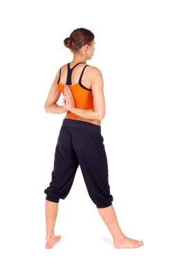 Woman Practicing Yoga Exercise clipart