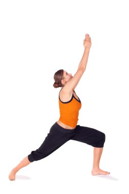 Woman Practicing Warrior Pose 1 Yoga Exercise clipart