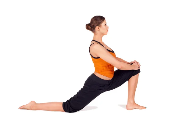 Passen aantrekkelijke vrouw beoefenen van yoga uitrekken pose — Stockfoto